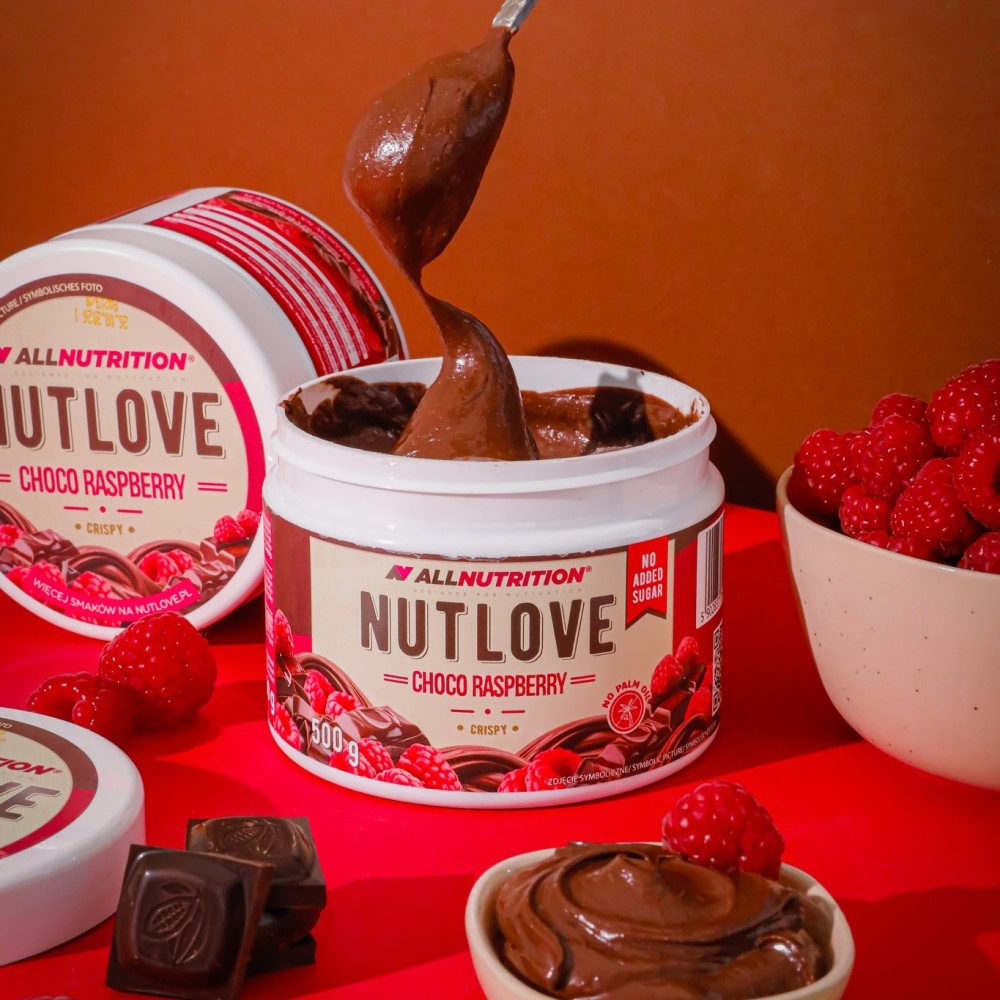 Close-up of Allnutrition NUTLOVE Choco Raspberry Crispy spread showing creamy chocolate with crispy and raspberry bits
